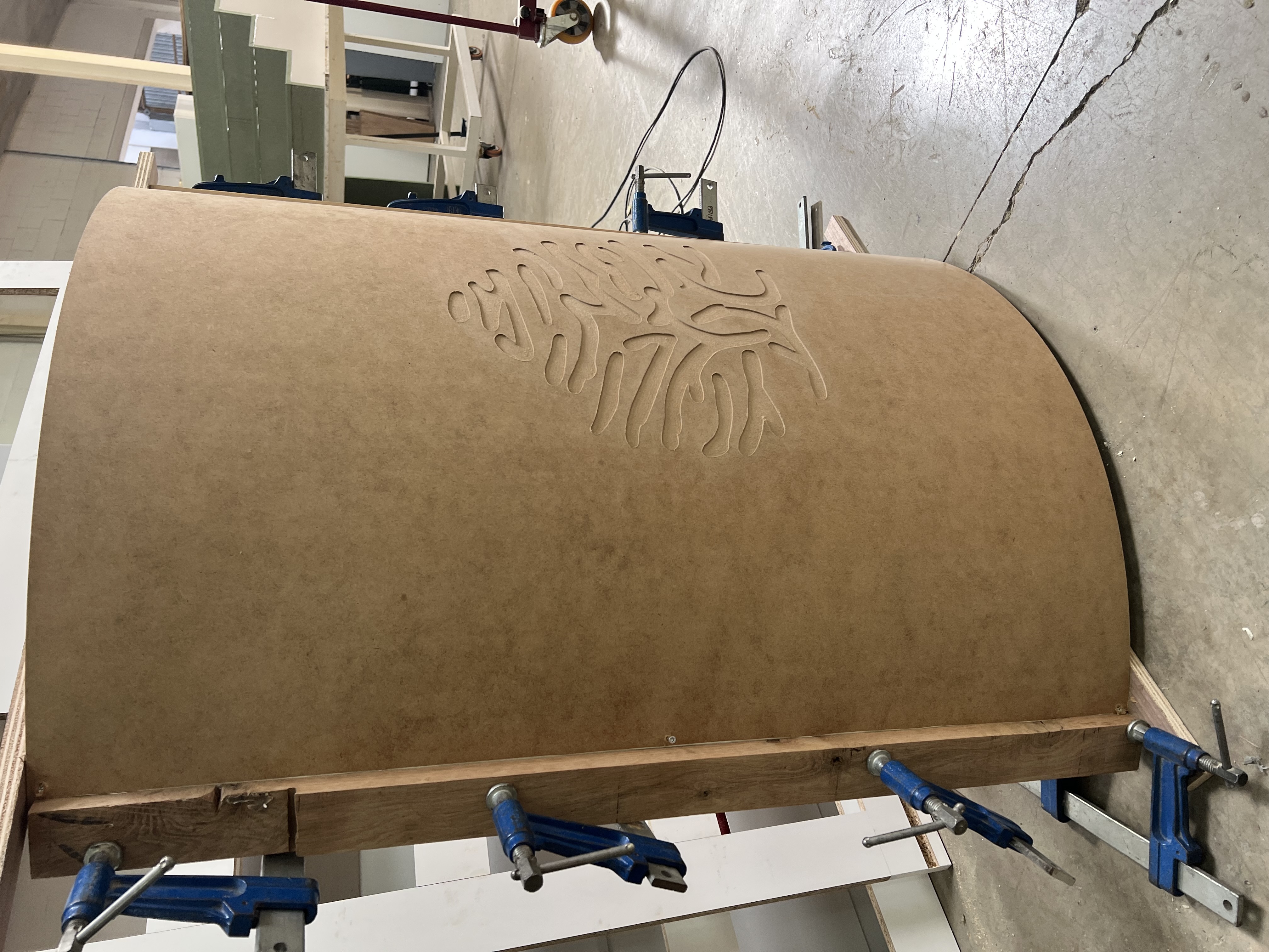 CNC-routed curved MDF relief panel